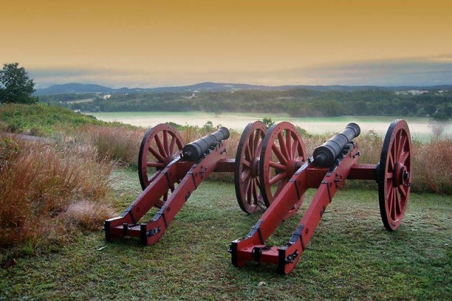 two old, historic canons overlooking cascading hills in Saratoga