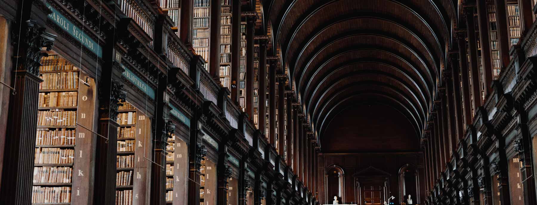 an old historic library with natural light from large windows